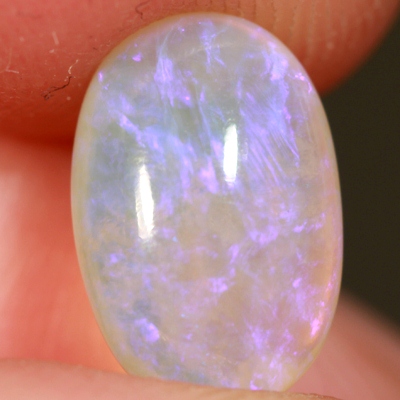SOLID CRYSTAL OPAL Transparent with soft purple throughout